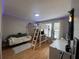 Bright bedroom with lofted bed, study desk, and contemporary design at 3339 Primrose Willow Dr, St Cloud, FL 34773