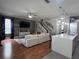 Open concept living space with a large sectional sofa, and kitchen bar at 3339 Primrose Willow Dr, St Cloud, FL 34773