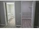 View from the bedroom to the ensuite bathroom and walk-in closet at 3428 Soho St # 208, Orlando, FL 32835