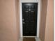 Front door with 'Bless All' doormat at 3428 Soho St # 208, Orlando, FL 32835