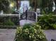 Well-maintained walking path leading to pier at a community amenity at 3428 Soho St # 208, Orlando, FL 32835
