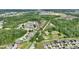 Home in a neighborhood with tree-lined streets and a variety of housing options at 373 Shady Oak Loop, Davenport, FL 33896