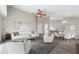 Bright living room with vaulted ceilings, modern decor and ample seating arrangement at 373 Shady Oak Loop, Davenport, FL 33896