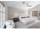 Inviting main bedroom with pool access and a comfortable seating area at 373 Shady Oak Loop, Davenport, FL 33896