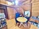 Attic room featuring wood floors, wood-paneled walls and ceiling, and a sloped design at 4075 Packard Ave, St Cloud, FL 34772