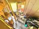 Bright interior featuring overhead lighting, storage area, and lots of natural light with exposed wooden beams at 4075 Packard Ave, St Cloud, FL 34772