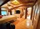 Spacious main bedroom with ensuite bathroom, hardwood floors and ceiling fan at 4075 Packard Ave, St Cloud, FL 34772