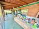 Spacious covered back porch and a outdoor area at 4075 Packard Ave, St Cloud, FL 34772