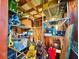 An indoor storage area is seen with metal shelving and assorted items at 4075 Packard Ave, St Cloud, FL 34772