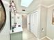 Bathroom featuring a double vanity, modern fixtures, tiled flooring, and neutral color palette at 4125 Packard Ave, St Cloud, FL 34772