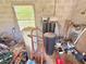 Inside a cluttered storage room full of an assortment of equipment, tools and supplies at 4125 Packard Ave, St Cloud, FL 34772