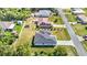 Aerial view of a residential property featuring mature trees and landscaping at 4476 Sw 149Th St, Ocala, FL 34473