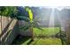 A banana tree grows in this well fenced backyard at 4830 Red Bay Dr, Orlando, FL 32829
