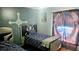 ' bedroom with Star Wars themed decor, featuring twin beds and a fun, imaginative design at 4830 Red Bay Dr, Orlando, FL 32829