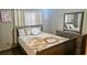 Bedroom featuring a full bed, a dresser and natural light at 4830 Red Bay Dr, Orlando, FL 32829
