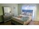Comfortable bedroom with modern furnishings, soft lighting, and a serene color palette at 4830 Red Bay Dr, Orlando, FL 32829