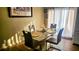 Dining room features a modern table with seating for four and natural light at 4830 Red Bay Dr, Orlando, FL 32829