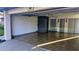 Spacious garage with painted walls and tile flooring at 4830 Red Bay Dr, Orlando, FL 32829