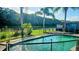 Fenced in backyard pool with a view of the lake at 4830 Red Bay Dr, Orlando, FL 32829