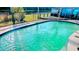 Fenced in backyard pool with a view of the lake at 4830 Red Bay Dr, Orlando, FL 32829