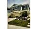 Charming two-story home with well-maintained landscaping, a two-car garage, and neutral paint at 5519 Braken Fern Way, Leesburg, FL 34748