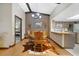 Inviting dining area with chandelier, rustic decor, and adjacent kitchen at 6161 Bass Hwy, St Cloud, FL 34771