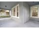 Covered front porch featuring neutral tones and an inviting outdoor space at 6905 Beargrass Rd, Harmony, FL 34773