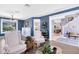Inviting living area showcasing wood-look floors, stylish furnishings, and a view into the front foyer at 716 Timberwilde Ave, Winter Springs, FL 32708