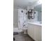 A well-lit bathroom with modern fixtures and ample storage space at 721 Benoi Dr, Davenport, FL 33896