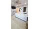 Bright bedroom featuring neutral tones, carpet floors, and a closet at 721 Benoi Dr, Davenport, FL 33896