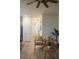 Cozy living area with wood-look floors, neutral decor, and inviting seating at 721 Benoi Dr, Davenport, FL 33896