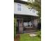 A screened porch offers outdoor relaxation and backyard views at 721 Benoi Dr, Davenport, FL 33896