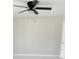 Bedroom with neutral paint, ceiling fan and light gray floors at 841 Fir Ave, Frostproof, FL 33843