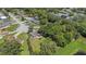 Tranquil property featuring a well-maintained yard with pond access at 8733 Catbriar Ln, Orlando, FL 32829