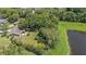 Private property with a mature tree line bordering a tranquil pond at 8733 Catbriar Ln, Orlando, FL 32829