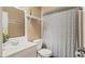 Cozy bathroom featuring a modern vanity, updated fixtures, and stylish tile work around the sink at 8733 Catbriar Ln, Orlando, FL 32829