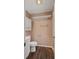 Standard bathroom with a toilet, vanity, medicine cabinet, and tile shower at 8733 Catbriar Ln, Orlando, FL 32829