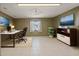 This bonus room has tile floors, neutral paint, and an exterior window at 8733 Catbriar Ln, Orlando, FL 32829