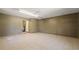 This bonus room has neutral paint, tile flooring, and a door to another room at 8733 Catbriar Ln, Orlando, FL 32829
