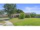 Single-story home with a well-kept lawn and charming curb appeal at 8733 Catbriar Ln, Orlando, FL 32829