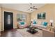 Inviting living room with comfortable seating, stylish decor, and natural light at 8733 Catbriar Ln, Orlando, FL 32829