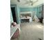 Spacious bedroom featuring a canopy bed, a teepee, and natural light at 8986 Fullerwood Ave, Orlando, FL 32832