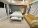Bright main bedroom suite features tray ceilings, a sitting area, and luxury decor at 8986 Fullerwood Ave, Orlando, FL 32832