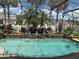 Stunning screened-in pool surrounded by mature landscaping and lush greenery at 8986 Fullerwood Ave, Orlando, FL 32832