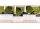 An aerial view of the home's backyard featuring meticulously maintained landscaping and greenery at 904 Michigan Ave, St Cloud, FL 34769
