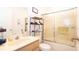 Bathroom with shower, vanity, and toilet at 904 Michigan Ave, St Cloud, FL 34769