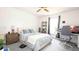 Bedroom with neutral walls, ceiling fan, carpet floors, and window at 904 Michigan Ave, St Cloud, FL 34769