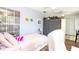 Bedroom features desk, closet doors, and a light purple wall at 904 Michigan Ave, St Cloud, FL 34769