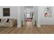 Inviting foyer with hardwood floors, leading to a bright living area with modern decor at 933 Jasmine St, Celebration, FL 34747