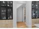 A pantry featuring wooden shelves and cabinets for storage at 933 Jasmine St, Celebration, FL 34747
